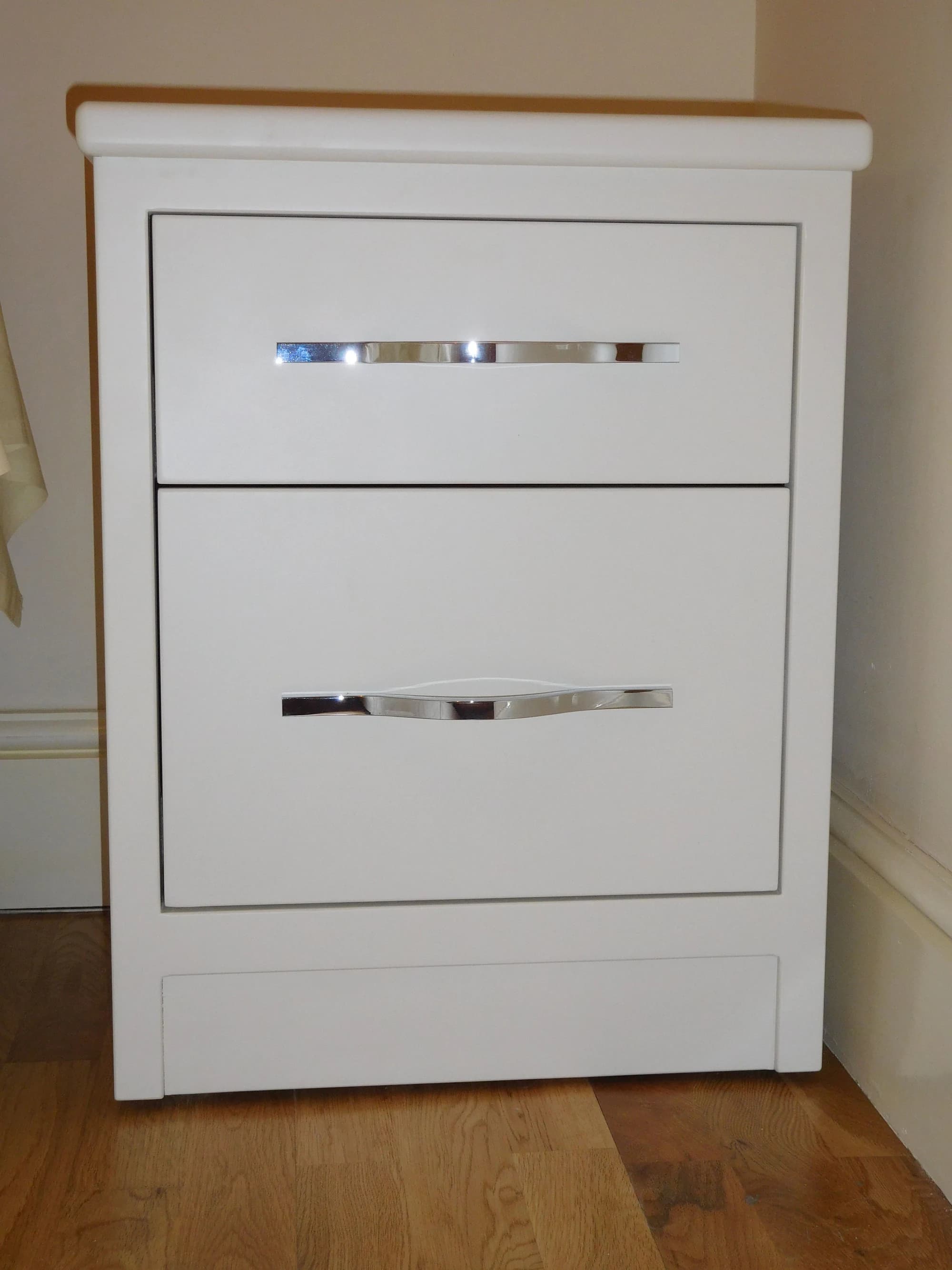 Bespoke stacked drawers with polished handles