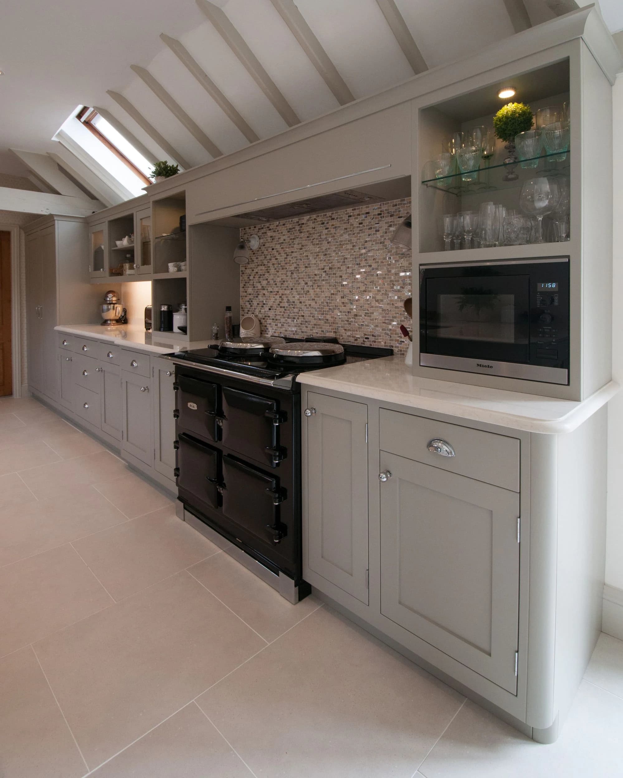 Black Aga set into fitted painted cabinetry